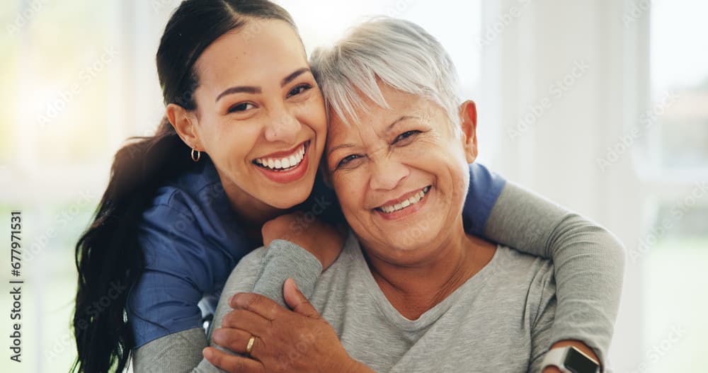 Caregiver sharing a warm moment with a senior at home